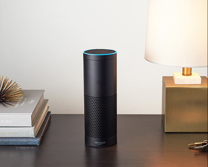 Amazon Echo voice device on side counter next to light