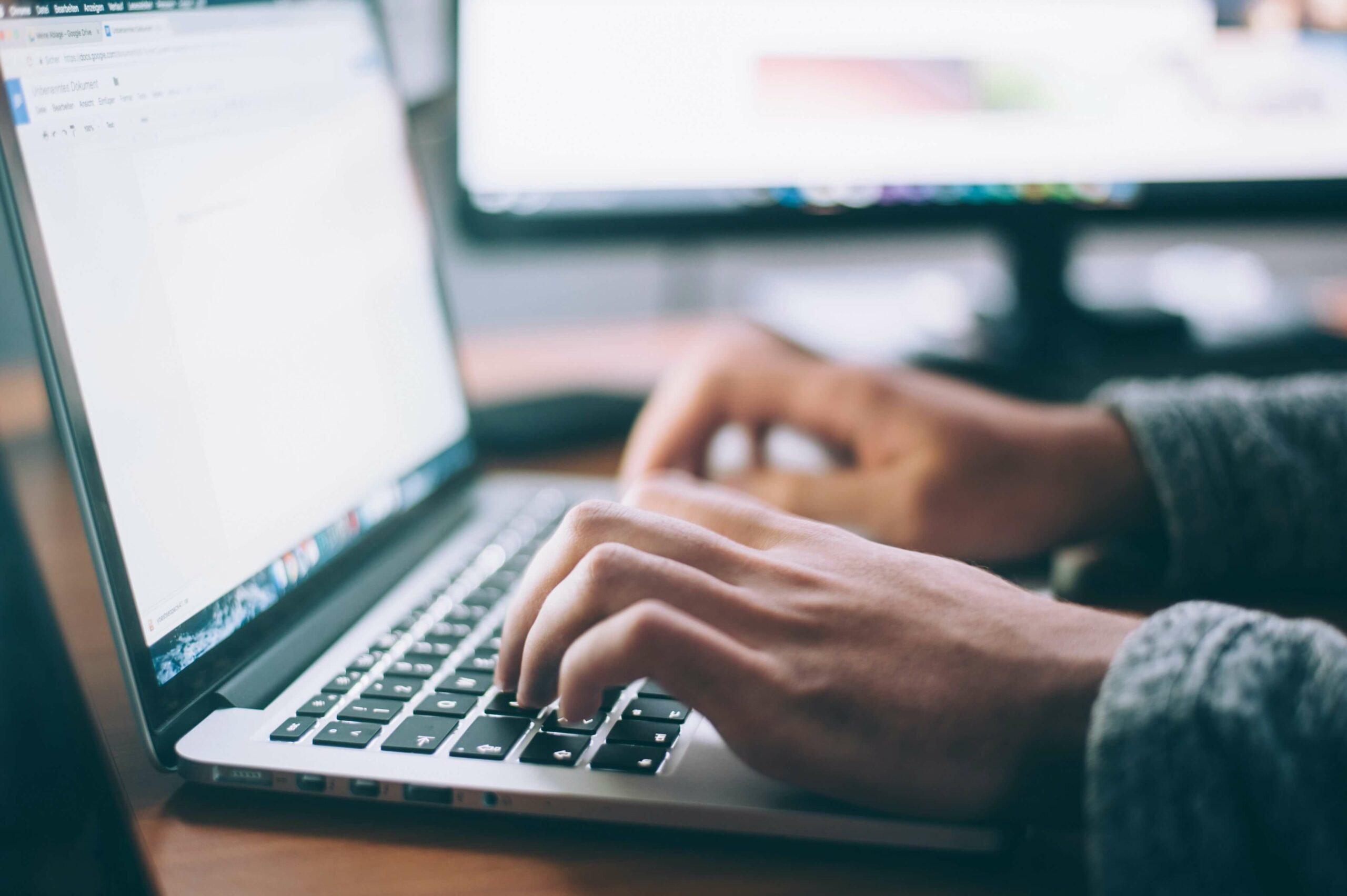 Person using laptop to search Google